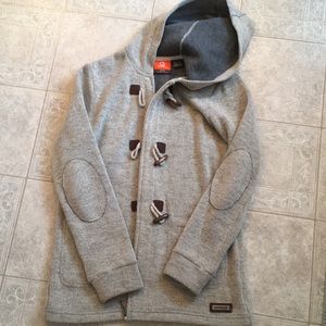 Barely worn, tiny hole near the second toggle